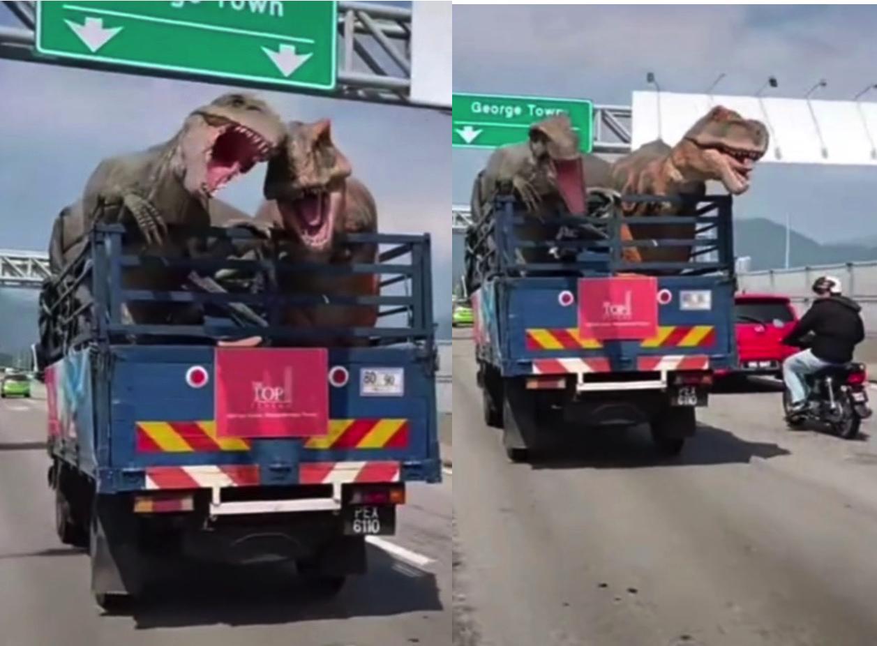 Pandai Elak Signboard, Pengguna Jalan Raya Dikejutkan Dengan Dua Dinosaur Yang Menari Atas Lori